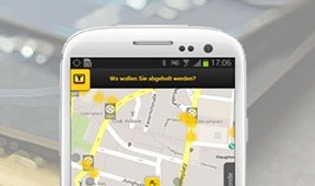 Bild zeigt ein Handy mit einer Taxi-Bestell-App.